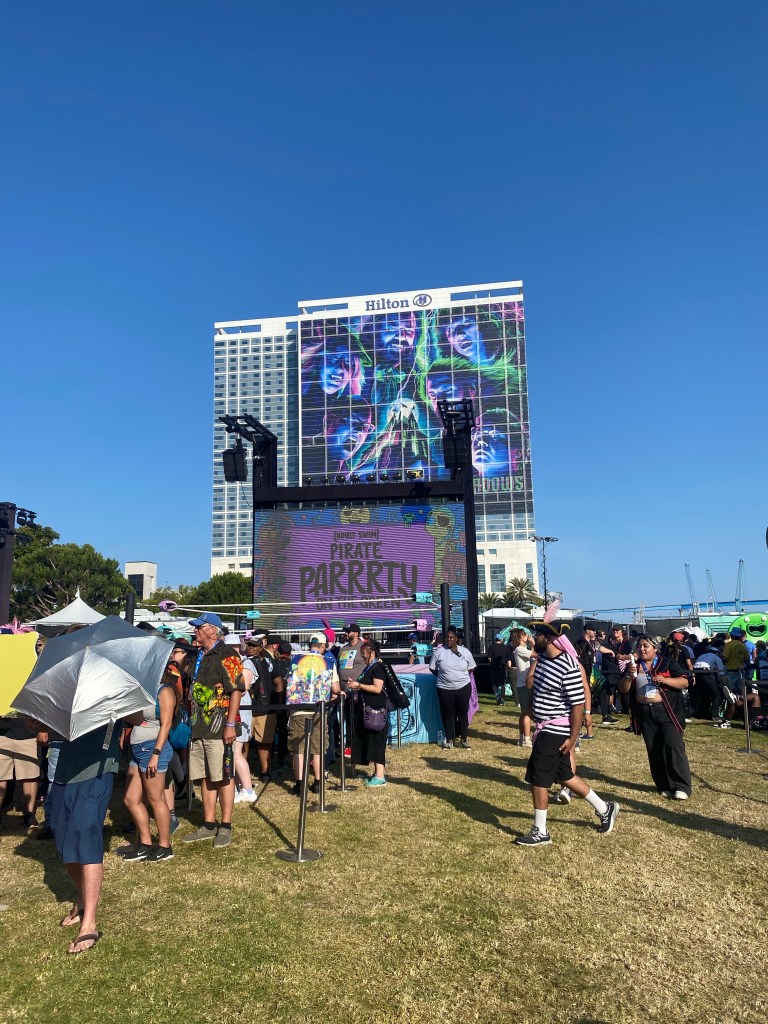 A picture at the Adult Swim Pirate Parrrty with the Hilton San Diego Bayfront in the background.